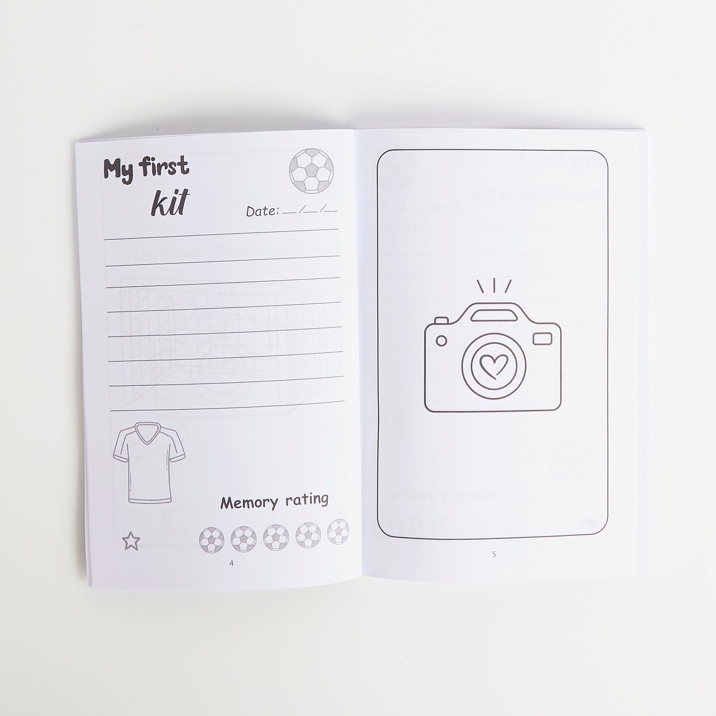 Open book with lined pages and illustrations on a white background