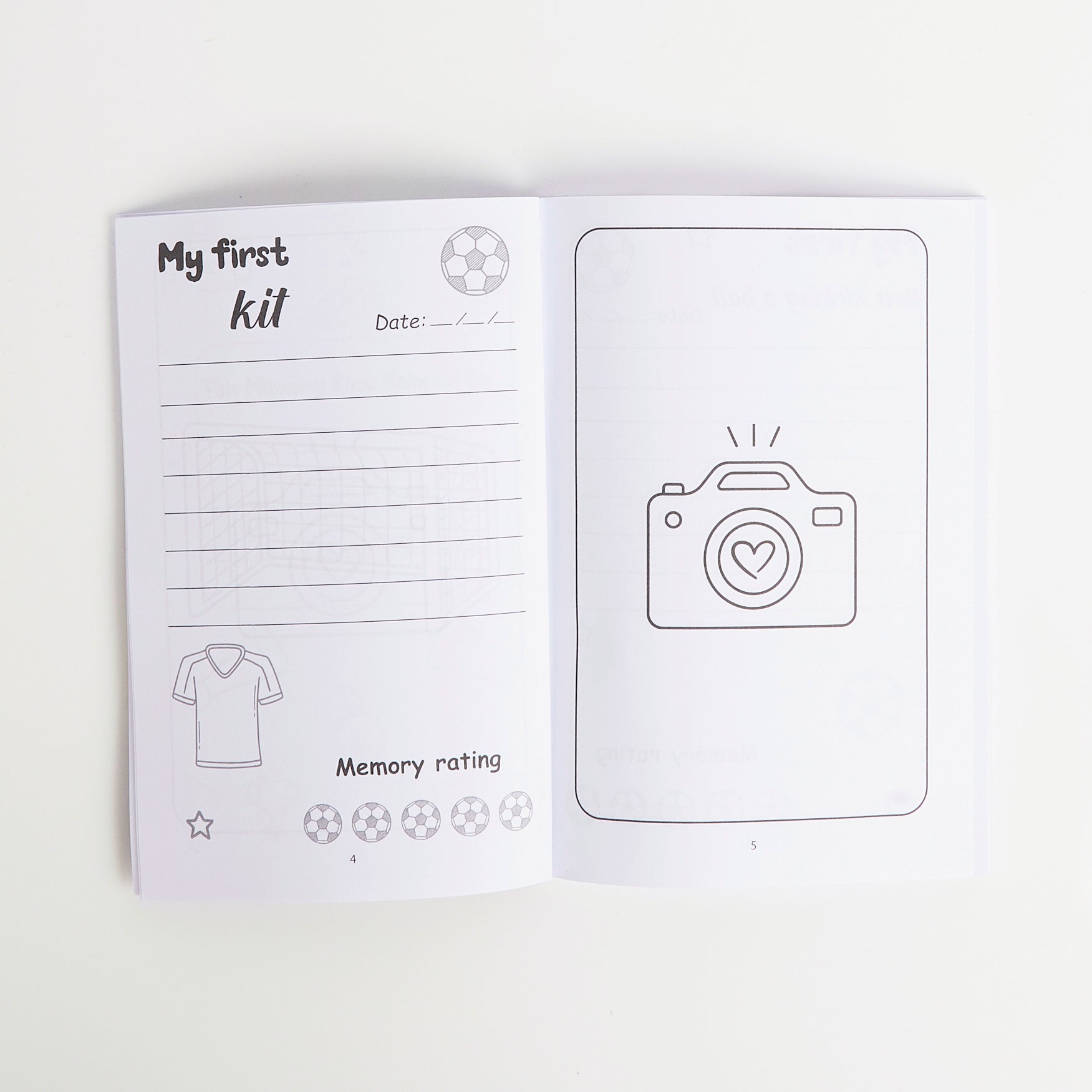 Open book with lined pages and illustrations on a white background